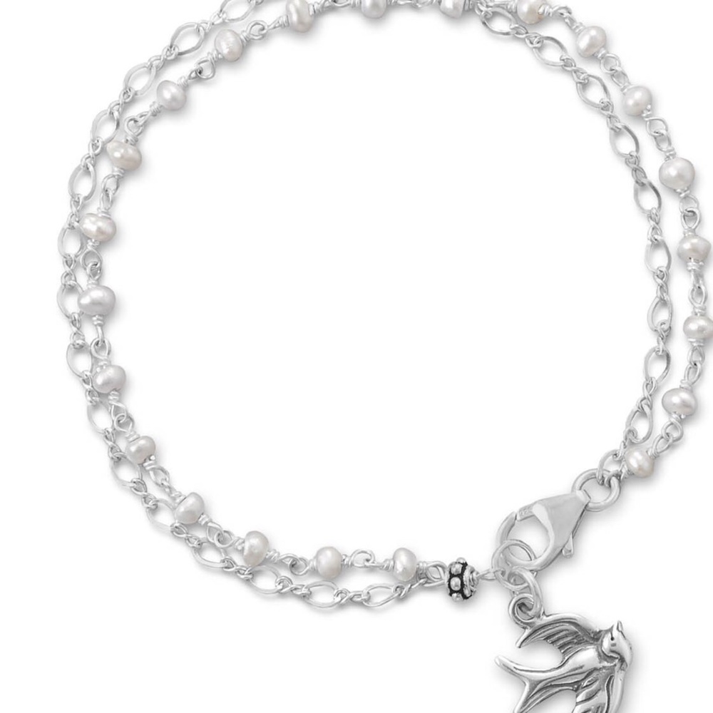Sterling silver and pearl bird bracelet